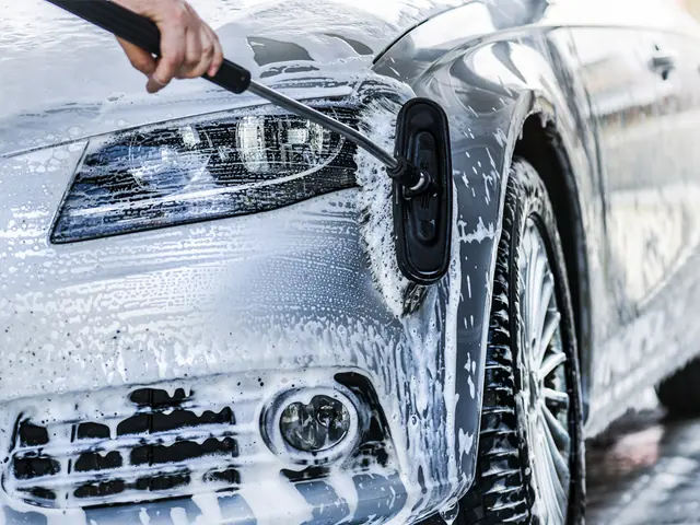 Washing a car with a brush at a touchless car wash