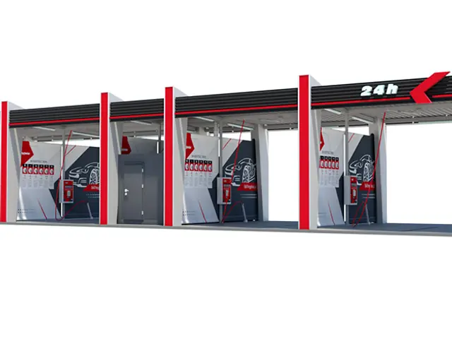 BKF NEXO touchless car wash construction with a louvred fascia and LED-lit columns