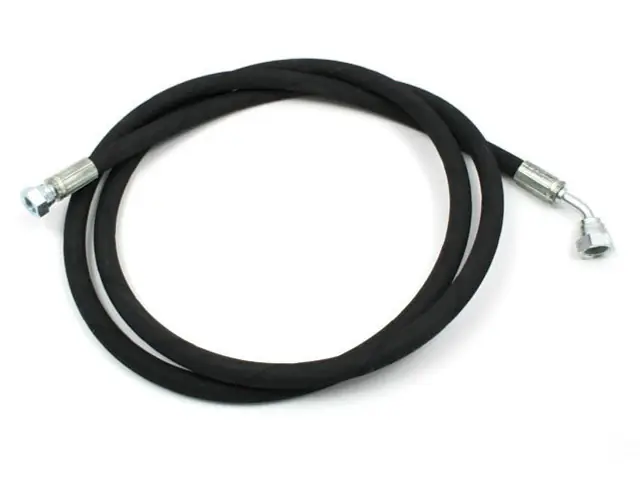 High-pressure hose at a car wash bay