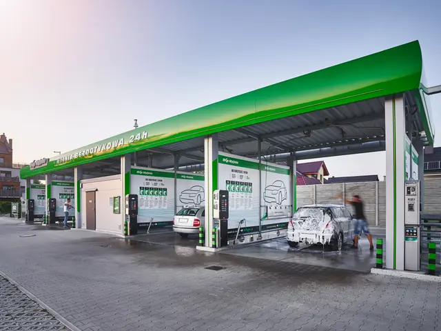 BKF touchless car wash bays with the canopy lit up