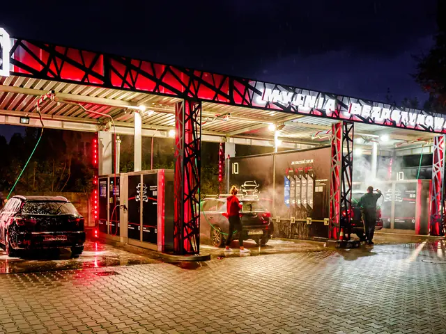 Touchless car wash with the illuminated BKF LUMI structure at night